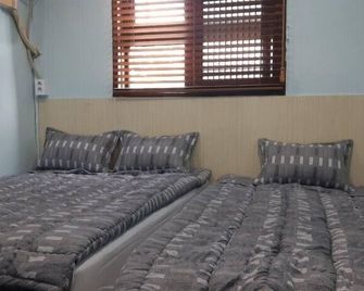 كيمستاي 9 - سيول - غرفة نوم