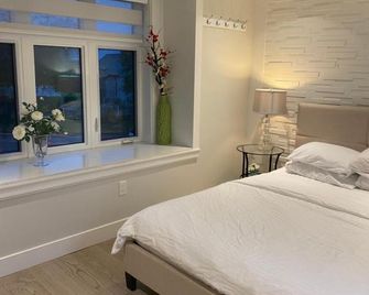 Six minutes to Rupert station - ונקובר - חדר שינה