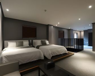 파티오 호텔 몬스터 빌리지 - 오산 - 침실