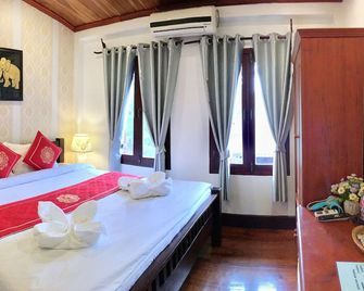 Pangkham Lodge - לואנג פראבאנג - חדר שינה