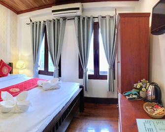 بانجكهام لودج - لوانغ برابانغ - غرفة نوم