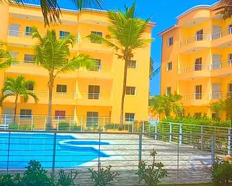 Villa Sol Apartments in Punta cana with Panoramic View Pool lights at Night - Bavaro
