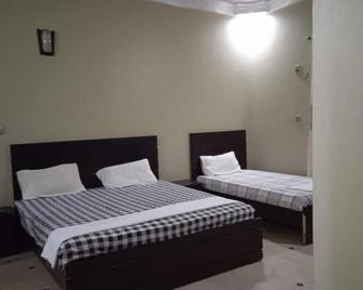 Hotel Serina Inn - Sukkur - Camera da letto