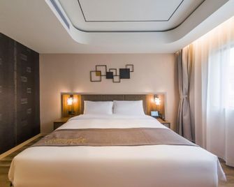 Homeinns Plus Qingdao Yinchuan West Road Software Park Shop - Qingdao - Bedroom