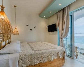 Delfini Beach Hotel - Archangelos