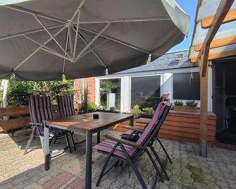 Ferienwohnung Mohnkopf - Wanderup - Innenhof