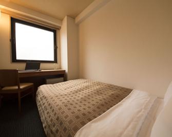Numazu Grand Hotel - Numazu - Slaapkamer