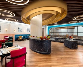 Ramada Encore by Wyndham Rajbagh Srinagar - Srinagar - Restaurant