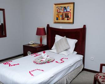 Siyonat Hotel - แอดดิสอาบาบา - ห้องนอน