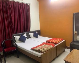 Narendra Guest House - Rāmnagar - Habitación