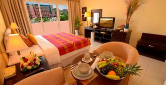 Parkside Hotel Apartment - Dubai - Schlafzimmer
