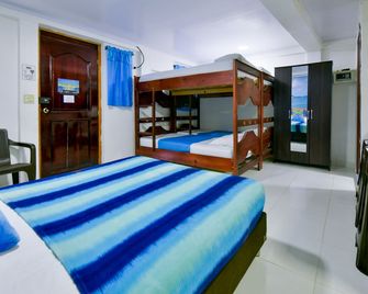 Posada Amaripucci - סן אנדרס - חדר שינה