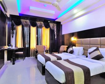 Hotel Crystal Ganga Heights - Haridwar - Slaapkamer