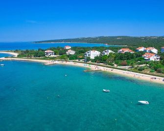 Apartments by the sea Novalja, Pag - 9326 - Novalja