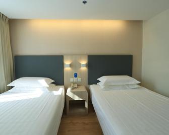 Hanting Hotel Tongliao Wanda Square - Tongliao - Bedroom
