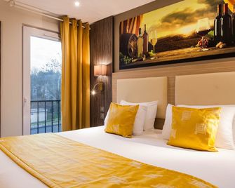 Comfort Hotel Orleans Olivet Provinces - Olivet - Schlafzimmer