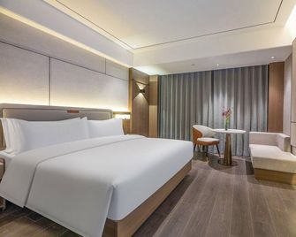 Molin Hotel (Hengshui Zaoqiang Reputation Building) - Hengshui - Bedroom