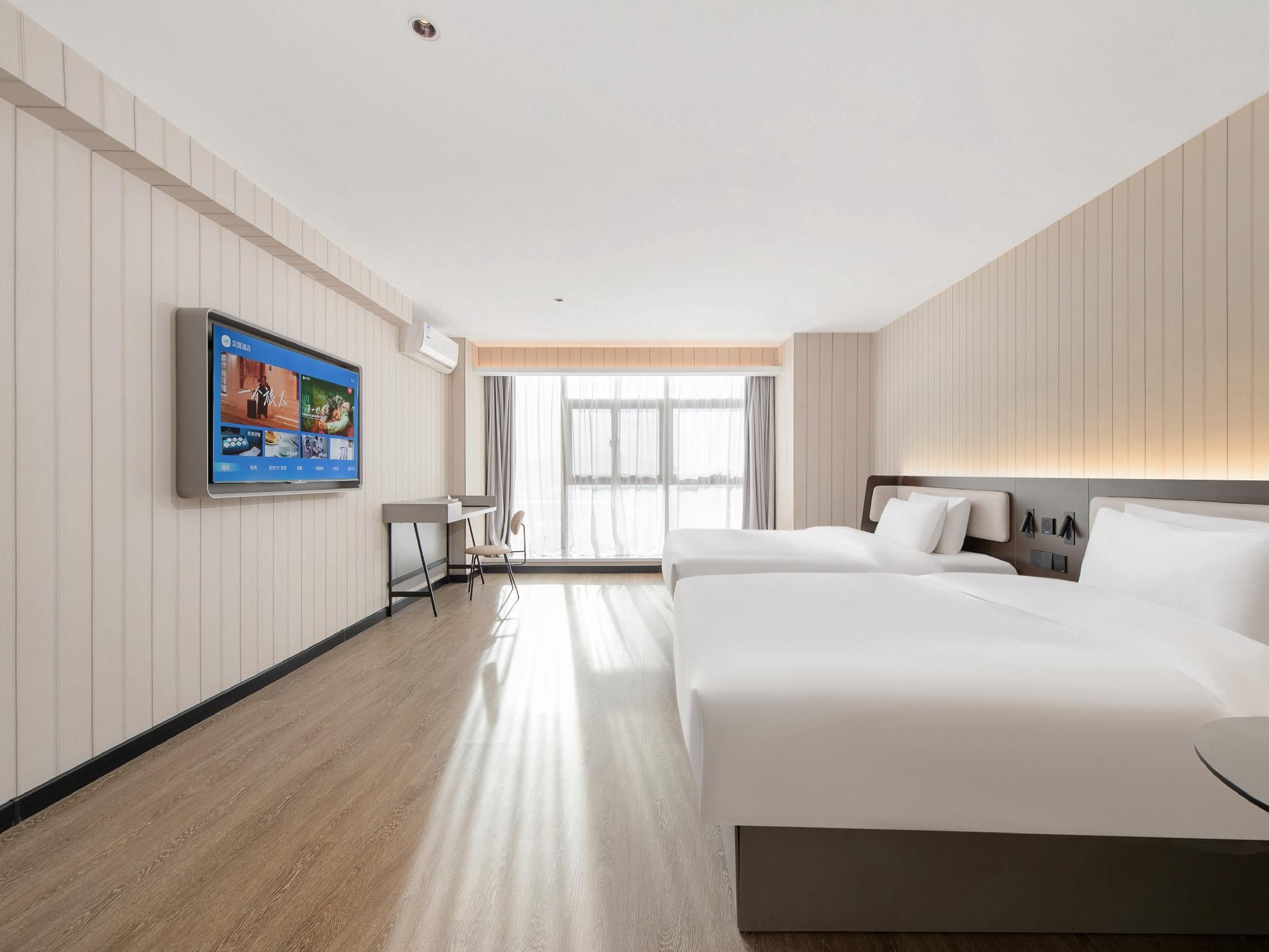 Hanting Hotel Dalian Sports Center - داليان - غرفة نوم