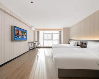 Hanting Hotel Dalian Sports Center - Dalian - Bedroom
