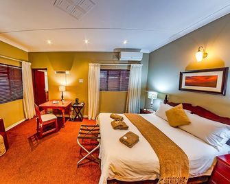 Amper Bo Guesthouse - פרטוריה - חדר שינה