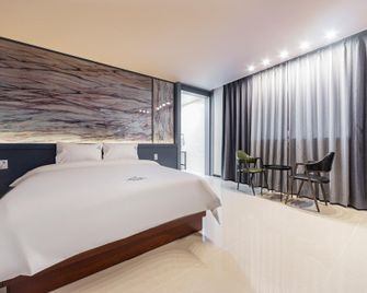 Pohang Haedo-Dong Aria Business Hotel - Pohang - Bedroom