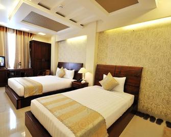 Bao Tran 2 Hotel - โฮจิมินห์ซิตี้ - ห้องนอน