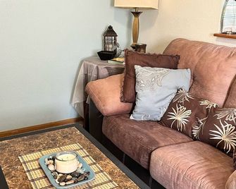 Fully-Furnished Entire Apartment at Rear of House - Minot - Living room