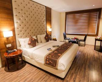 Hotel The Residency Srinagar - Srinagar - Phòng ngủ