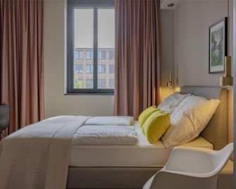 ipartment Leverkusen @HOME by Best Western - Леверкузен - Спальня