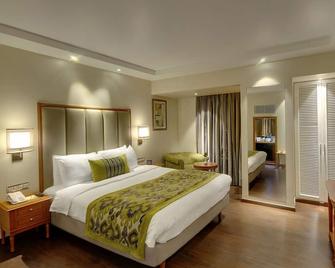 Lemon Tree Premier The Atrium Ahmedabad - אחמדאבאד - חדר שינה