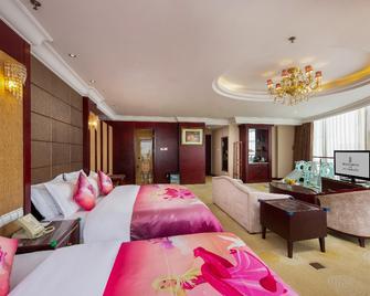 Rezen Hotel Linyi News Tower - Linyi - Slaapkamer