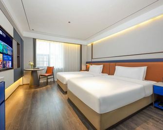 Home Inn Xi'An West 2Nd Ring Road Tumen - Xi'an - Habitación