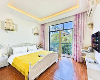 Spring Garden Hotel(Yangshuo Weststreet Lijiang Branch) - Guilin - Bedroom