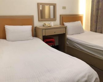 Huaxin Hotel - Jincheng Township - Habitación