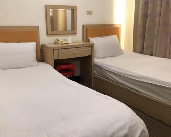 Huaxin Hotel - Jincheng Township - Quarto
