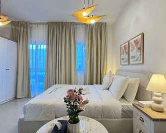 Al Reef Downtown Luxury Studio Stay - Abu Dhabi - Bedroom