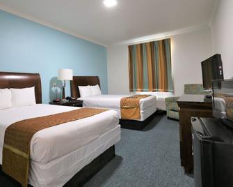 Executive Inn & Suites Cuero - Cuero - Schlafzimmer