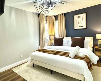 Comfy 4-bedroom apartment with WiFi, AC, free parking in wonderful Hempstead - Hempstead - Schlafzimmer