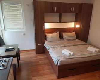 Apartments Kojic - Bar - Schlafzimmer