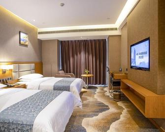 Peninsula Fino International Hotel - Weihai - Schlafzimmer