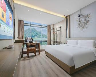 Renrenhong Guanpu Hotel - Liuzhou - Bedroom