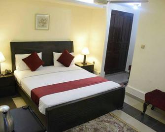 Elite Residence - Islamabad - Habitación