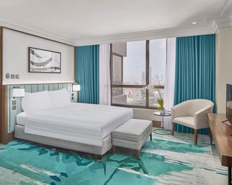 Holiday Inn & Suites Manila Galleria By IHG - Pasig - Schlafzimmer