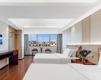 Ruyue Hotel - Lingshui - Schlafzimmer