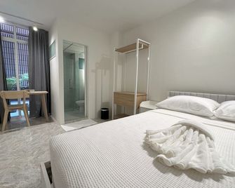 95 Lodge - בנגקוק - חדר שינה