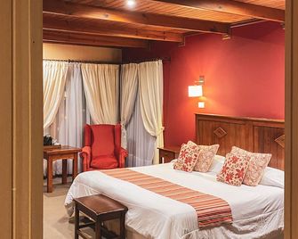 Boutique Hotel La Cantera - אל קאלאפטה - חדר שינה