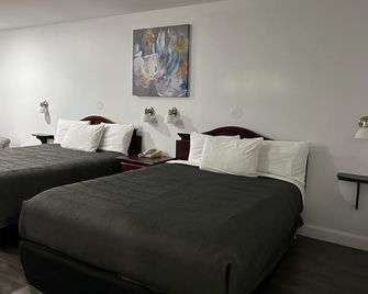 Complexe Hotelier Escoumins - Les Escoumins - Slaapkamer
