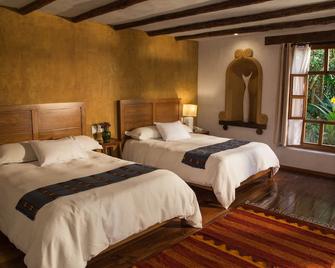 Guayaba Inn Boutique Hotel - סן קריסטובל דה לס קאסאס - חדר שינה