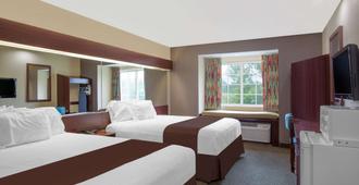 Microtel Inn & Suites by Wyndham Meridian - מרידיאן - חדר שינה