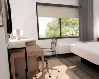 @HOME by Best Western McDonough Atlanta South - McDonough - Спальня